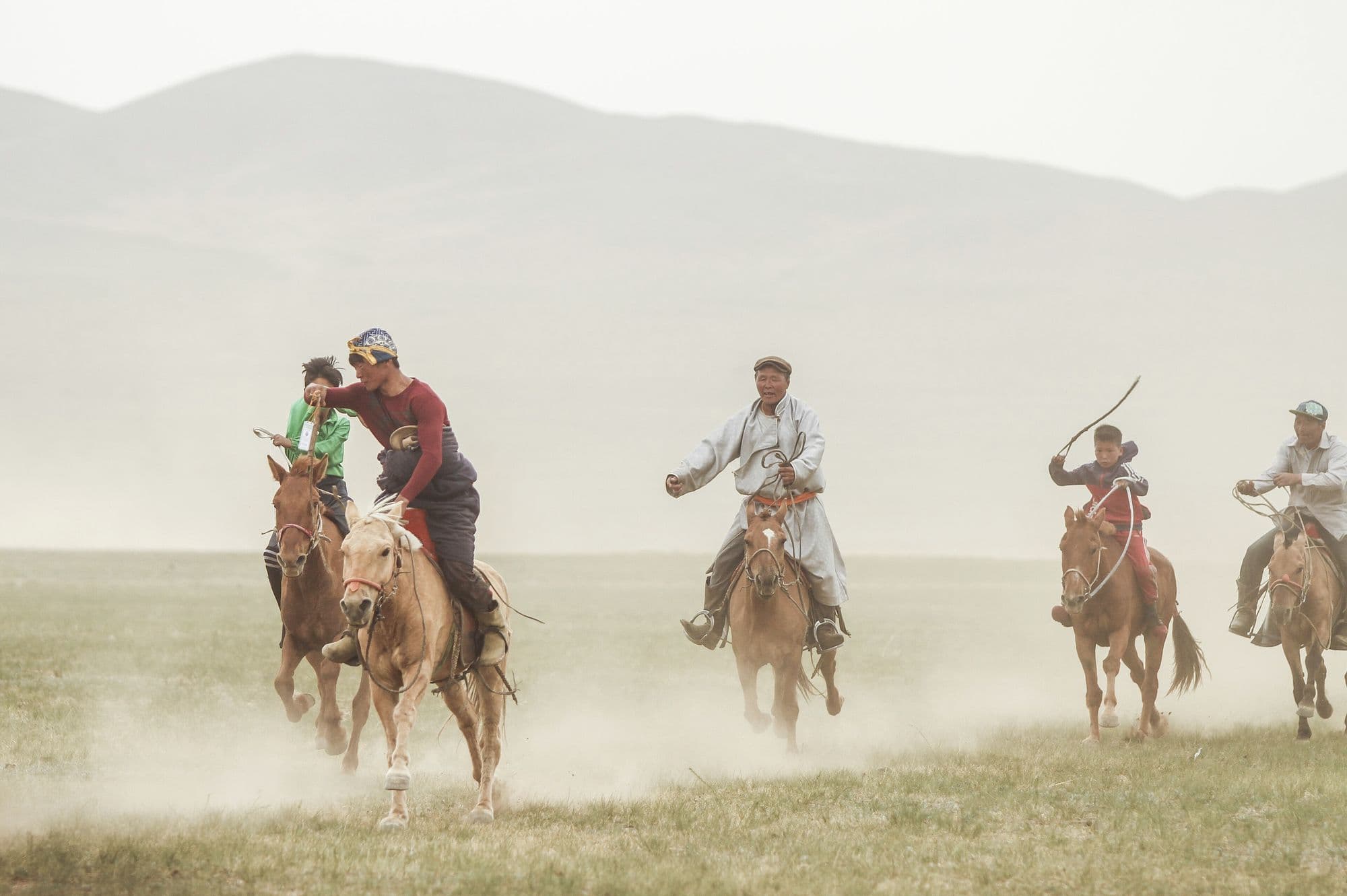 Mongolian locals participate in a horse race during a Naadam festival at Five Hills Training Area as part of Khaan Quest 2016 in Ulaanbaatar, Mongolia, June 3,